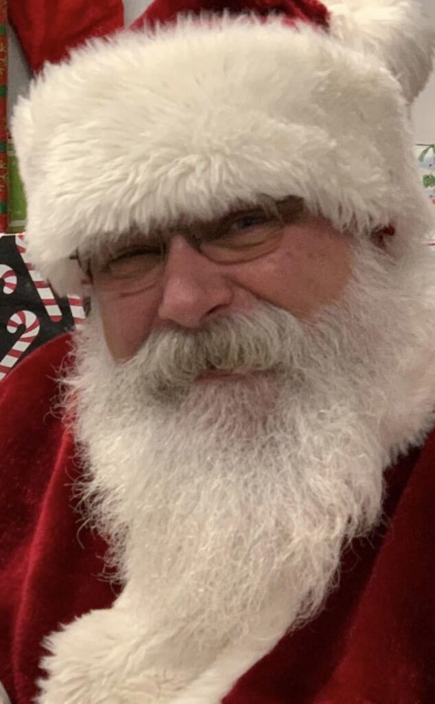 Close-up of Santa Tom smiling