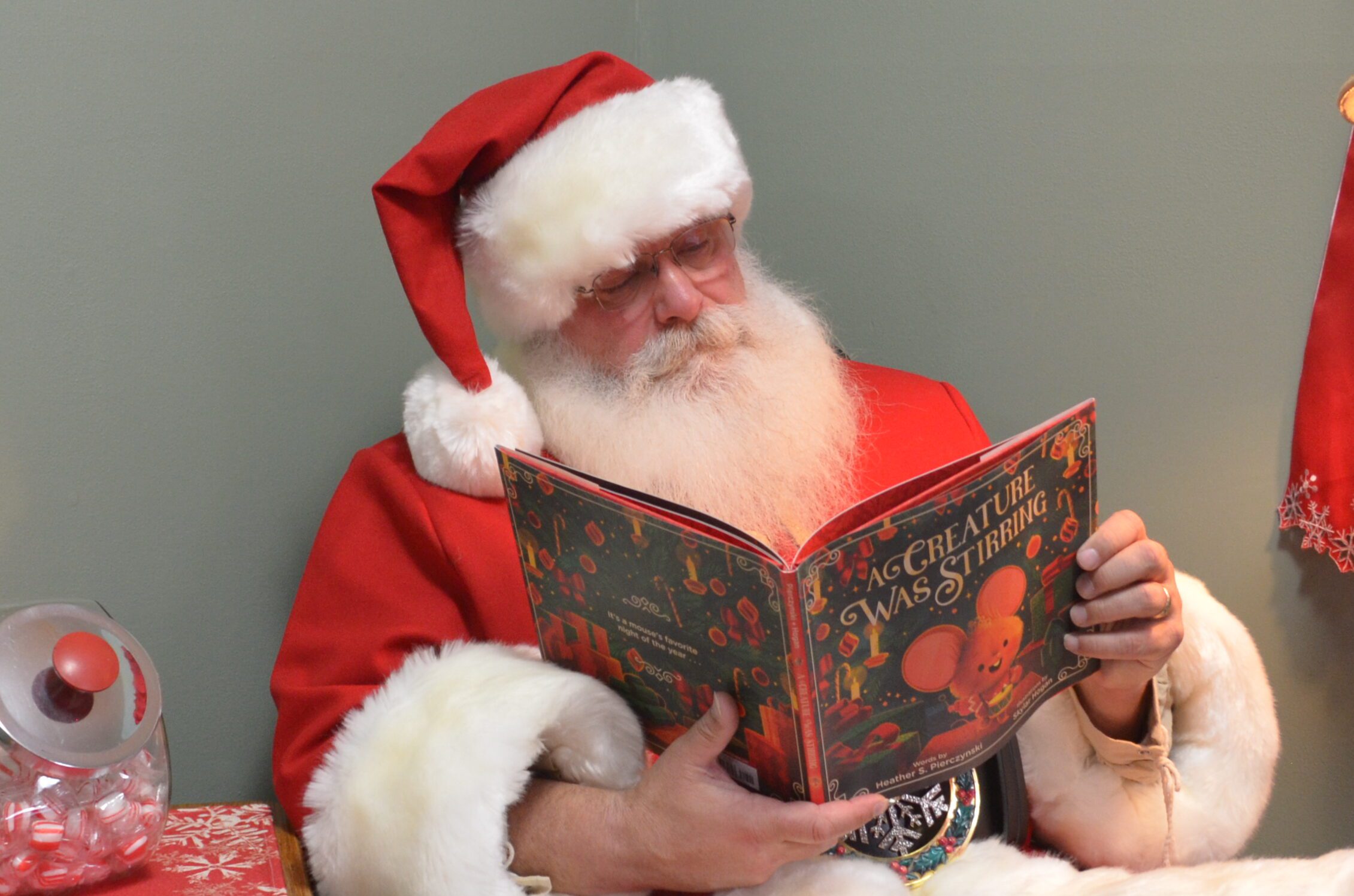 Santa Tom reading a storybook