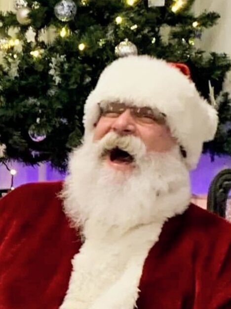 Santa Tom Laughing at a Meet and Greet Event